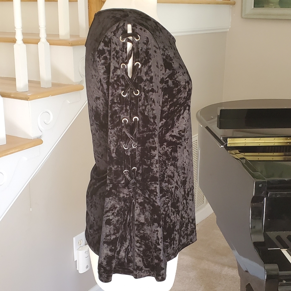 Black velvet top with bell sleeves. NWT